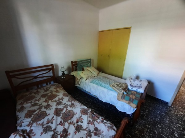 RETASADA CASA 2 DORMITORIOS CON COCHERA BARRIO SAN MARTIN